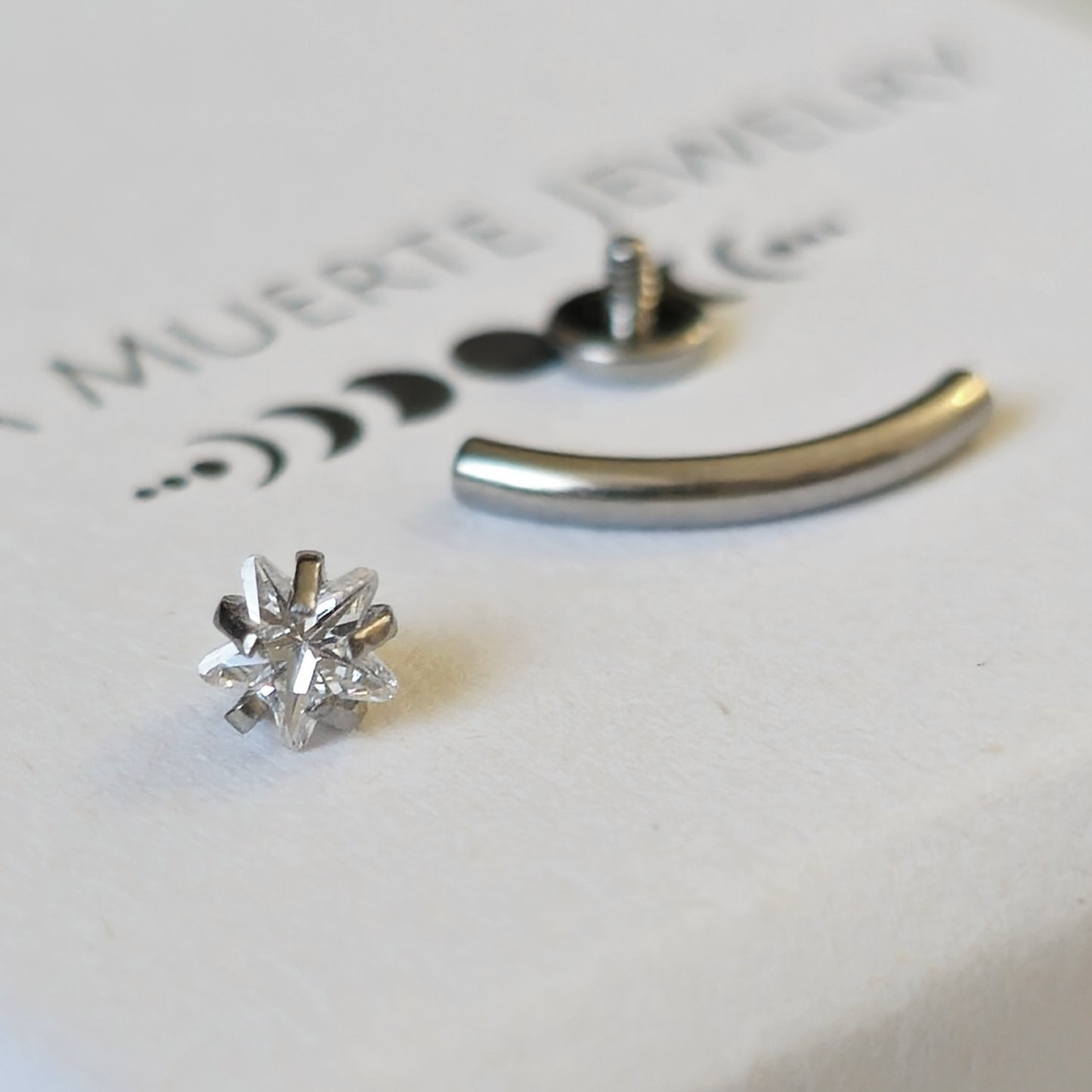 "Floating" Star Crystal Internally Threaded Curved Barbell