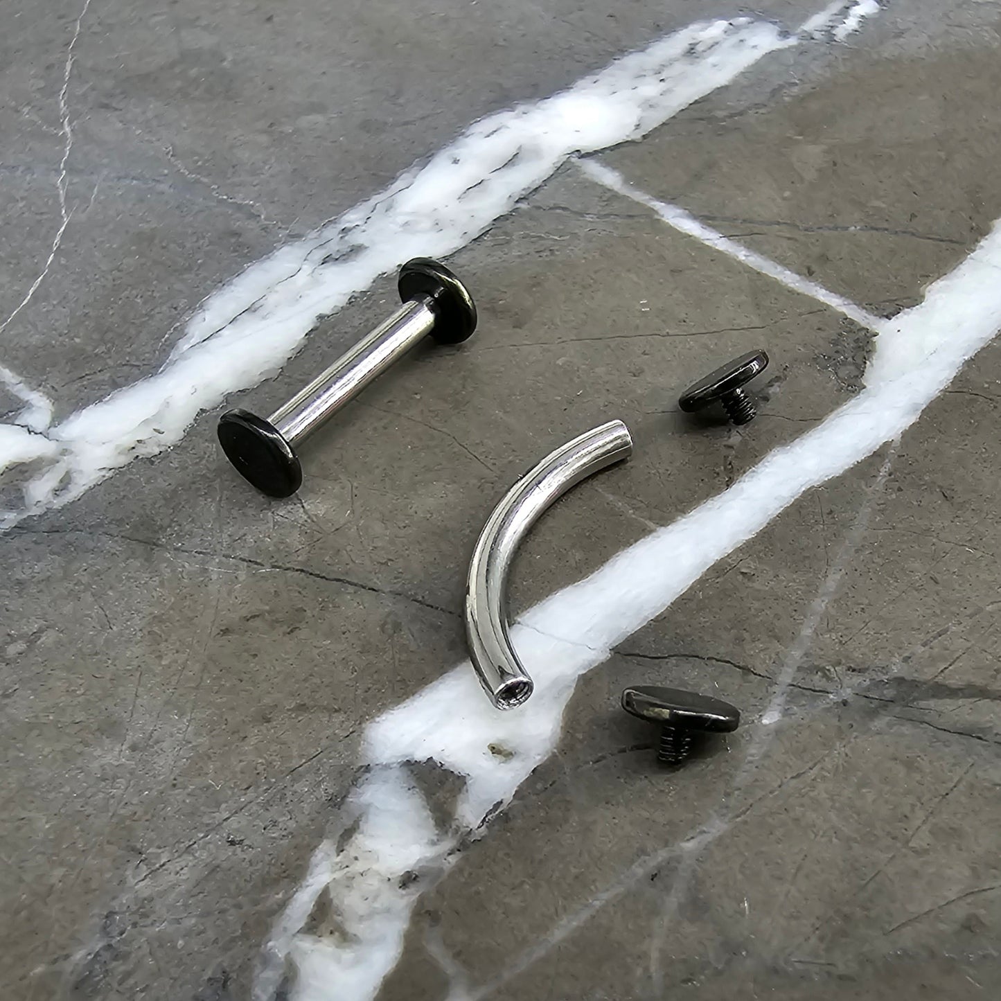 Silver with Black Flat Ends Barbell