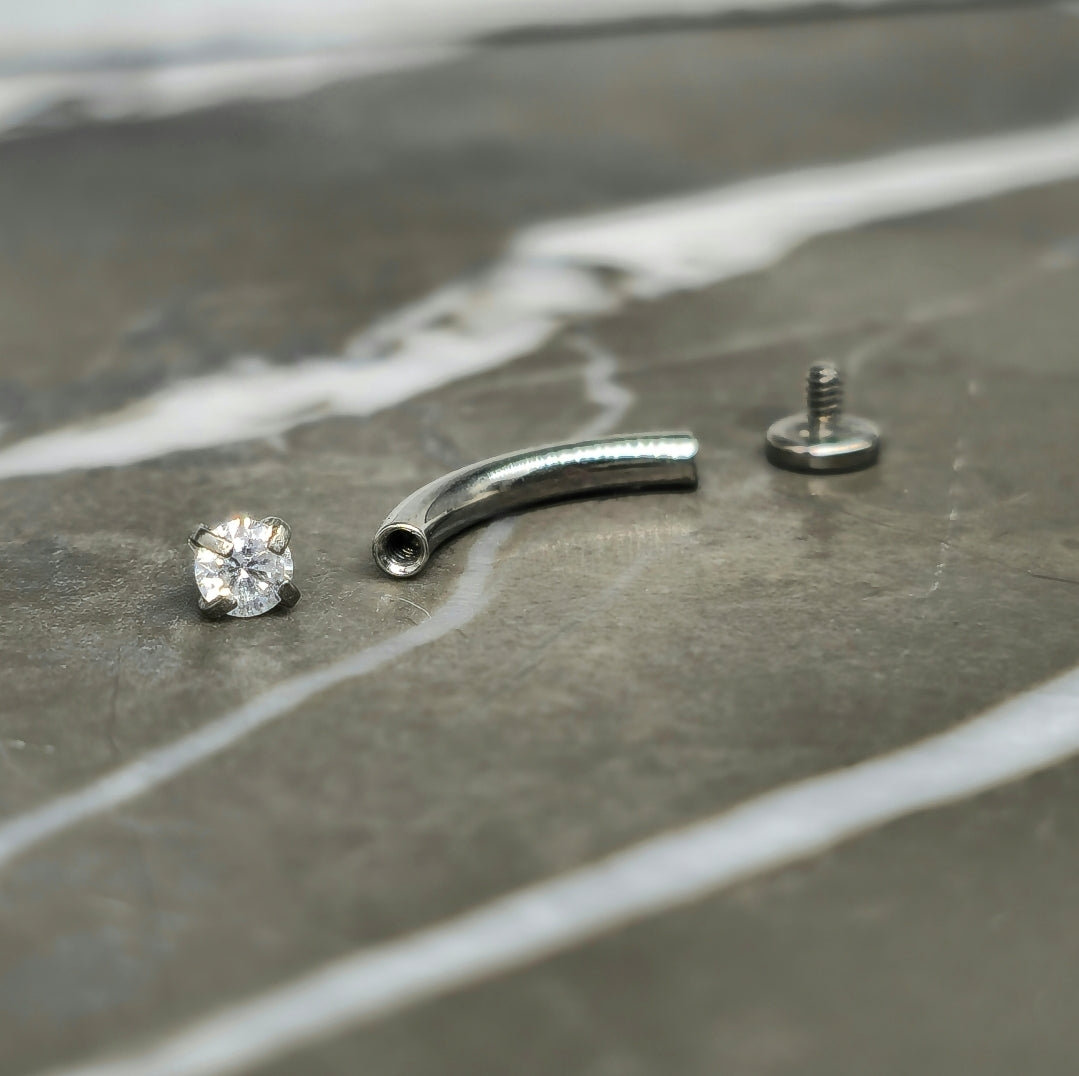 Tiny "Floating" Titanium Zirconia Curved Barbell