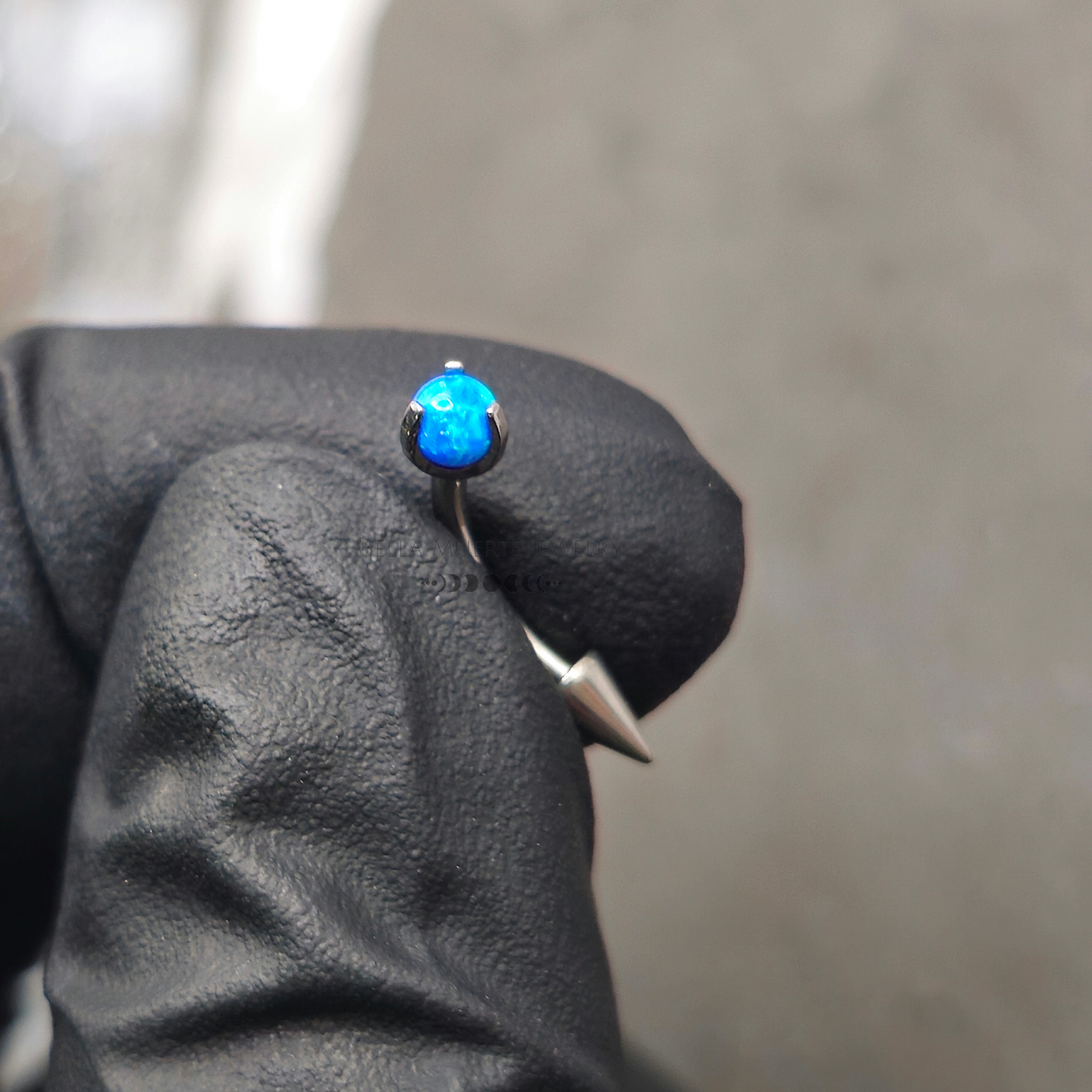 Blue Opal + Spike Curved Barbell